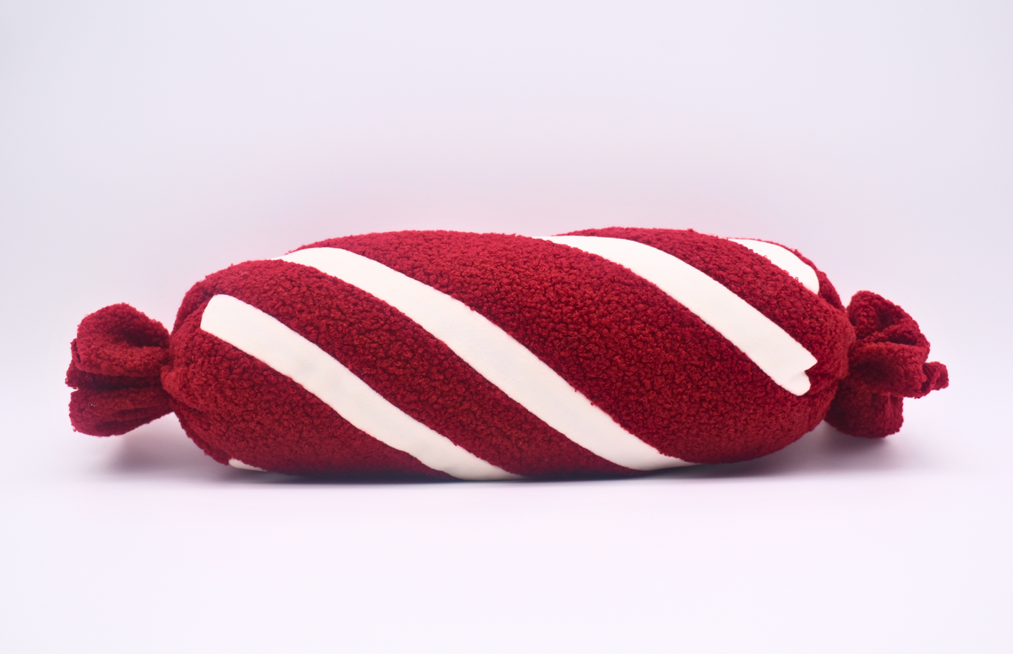 Cozy Peppermint Twist Roll Pillow